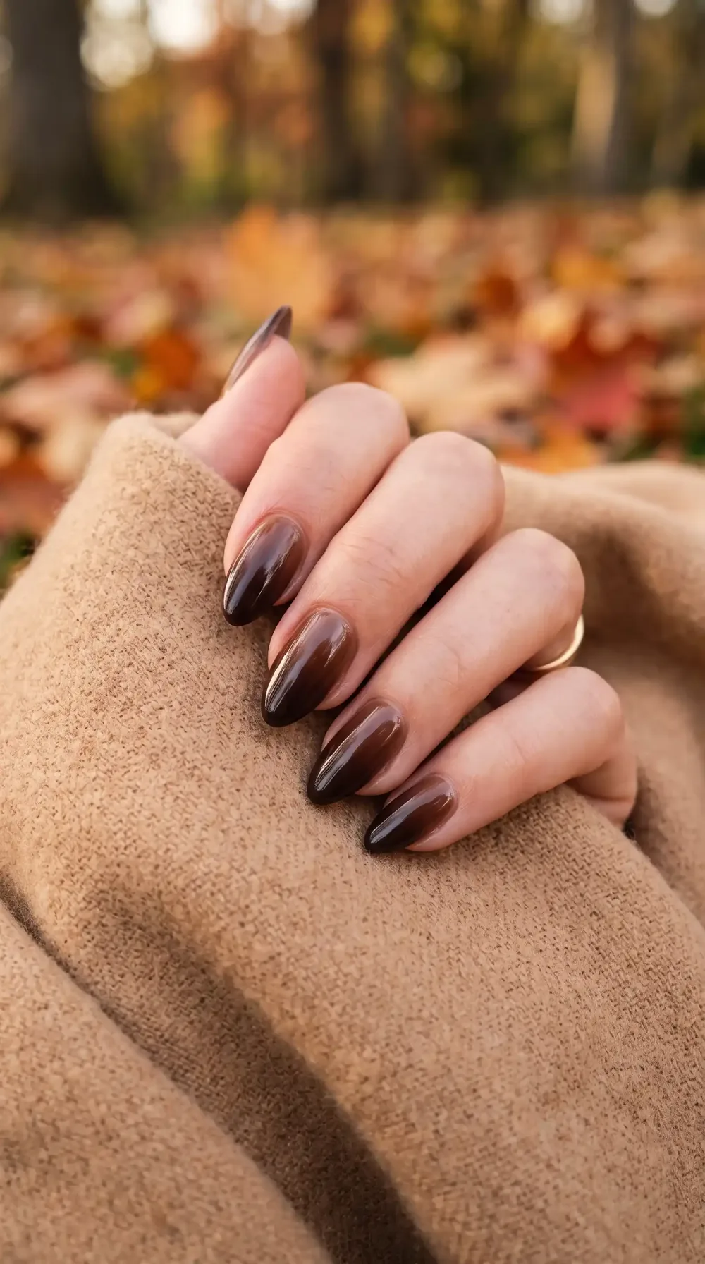 Chocolate ombre fall almond nails with a velvet shimmer Chocolate ombre fall almond nails with a velvet shimmer