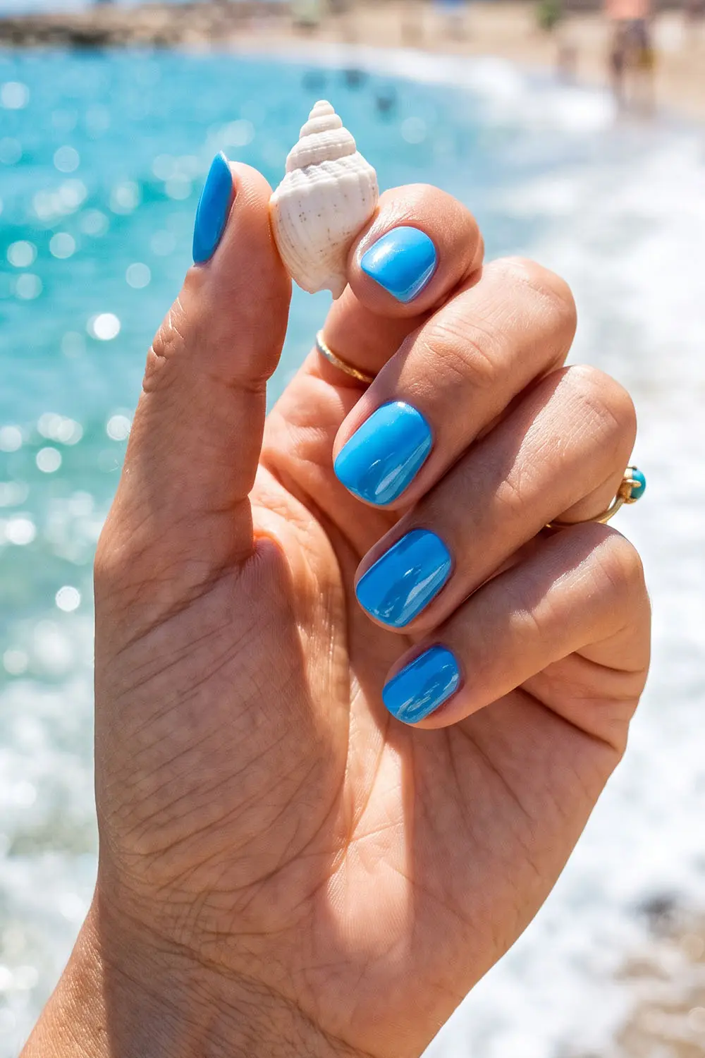 Bright blue and white summer nails by the ocean Bright blue and white summer nails by the ocean