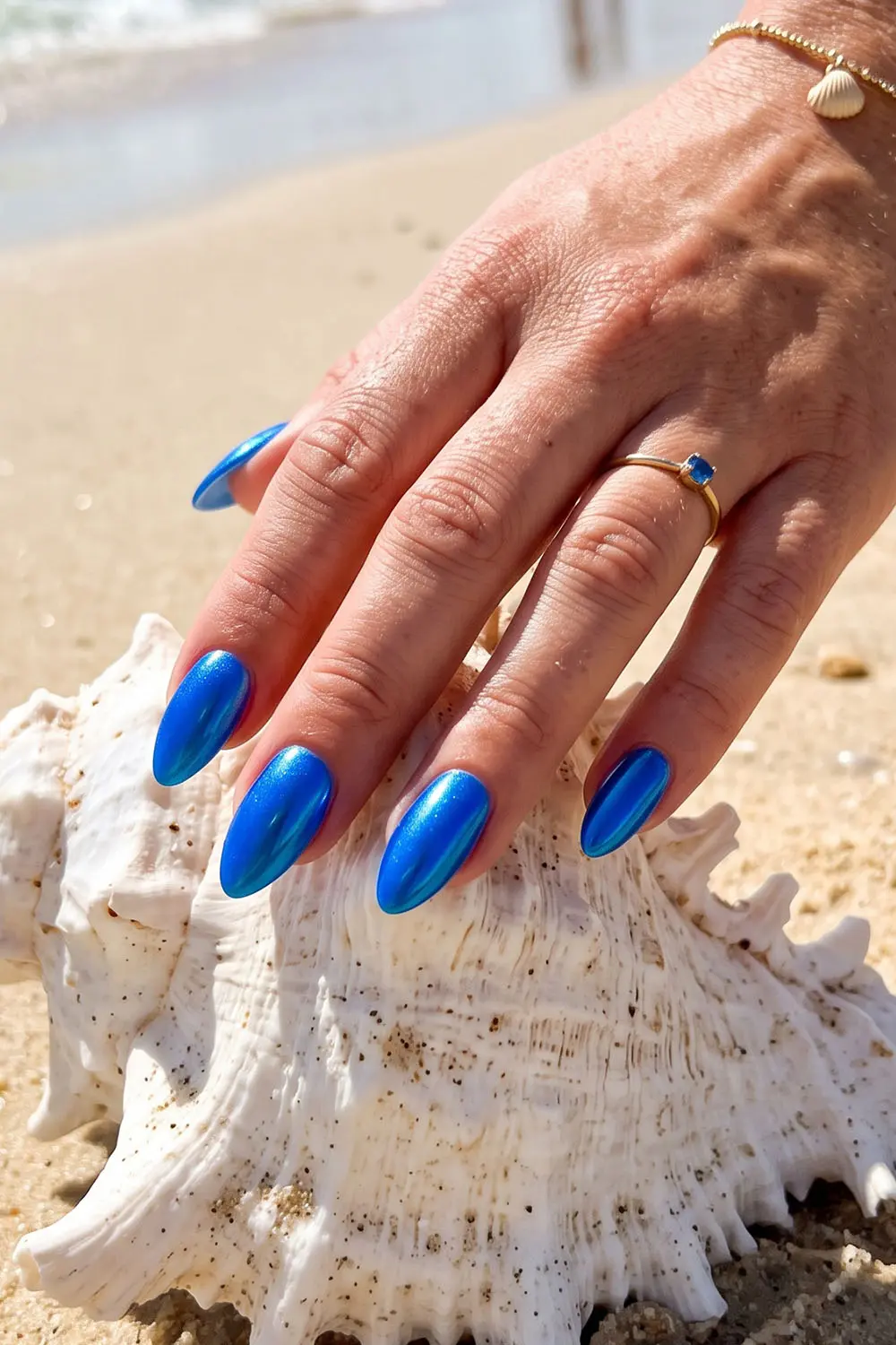 Glossy cobalt blue summer nails on almond nails Glossy cobalt blue summer nails on almond nails