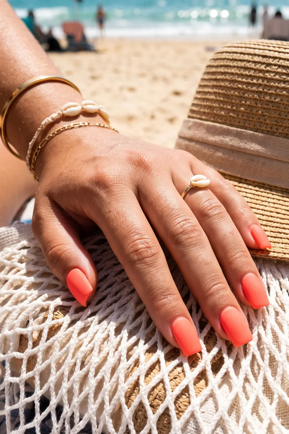 Glossy coral summer nails on almond shaped tips Glossy coral summer nails on almond shaped tips