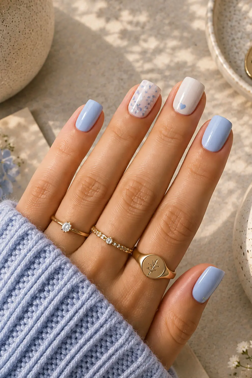 Periwinkle blue summer nails with speckled and marble accent nails Periwinkle blue summer nails with speckled and marble accent nails